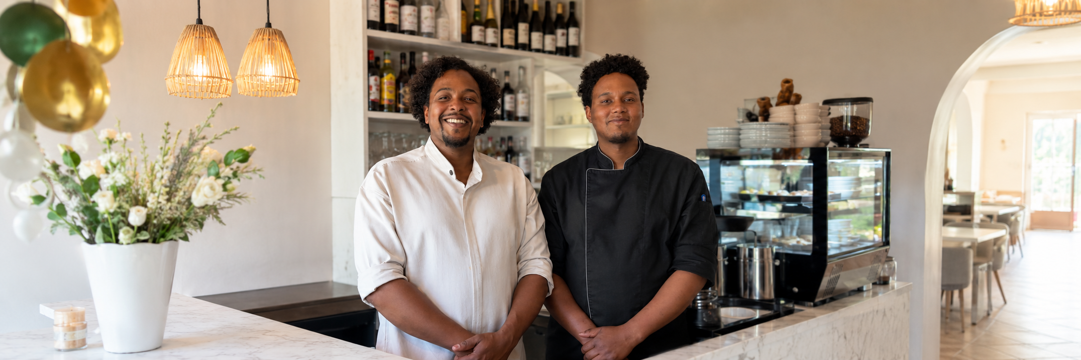 Café Flor owners behind the counter